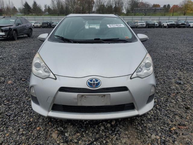 Photo 5 from auction – 2014 TOYOTA PRIUS C with VIN JTDKDTB32E1561095