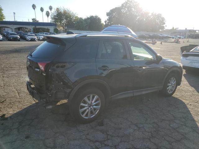 Photo 3 from auction – 2015 MAZDA CX-5 TOURI with VIN JM3KE2CY2F0545477