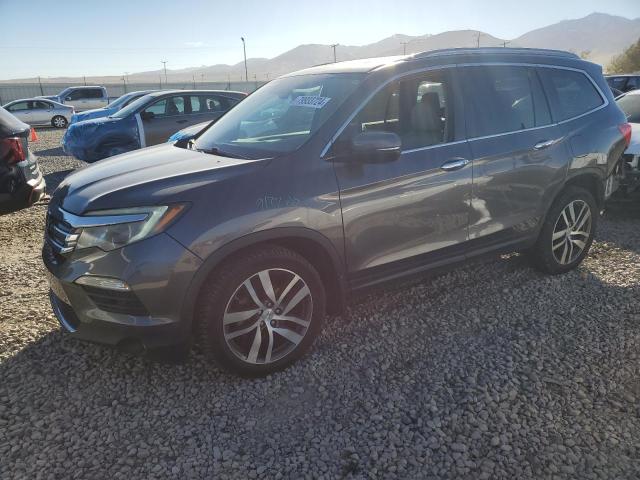 HONDA PILOT ELIT 2016 with VIN 5FNYF6H07GB014692 - Photo from auction