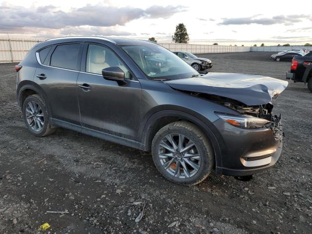 Photo 4 from auction – 2021 MAZDA CX-5 GRAND with VIN JM3KFBDM6M1329910