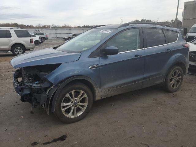 FORD ESCAPE SE 2018 with VIN 1FMCU9GD7JUC29537 - Photo from auction