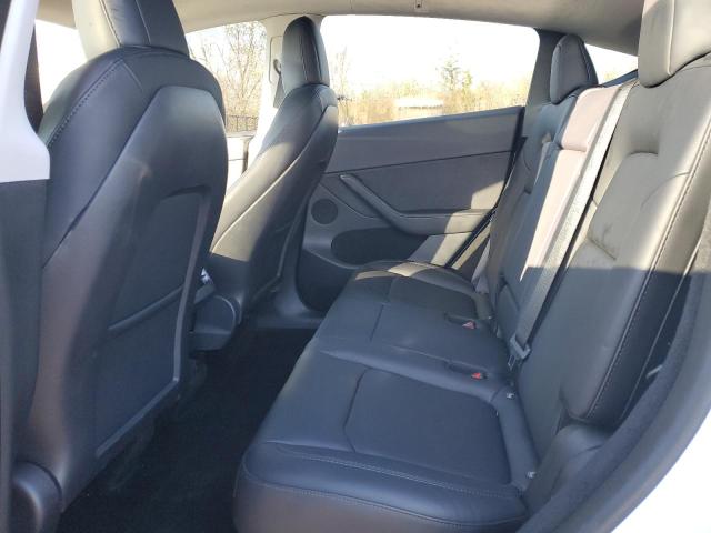 Photo 11 from auction – 2023 TESLA MODEL Y with VIN 7SAYGDEE0PF664033