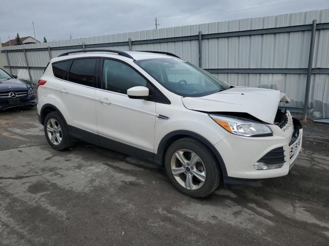 Photo 4 from auction – 2016 FORD ESCAPE SE with VIN 1FMCU9GX3GUC09451