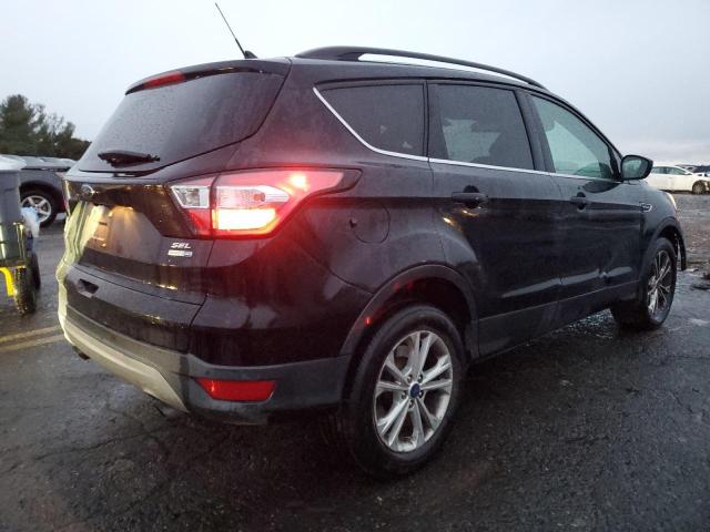 Photo 3 from auction – 2018 FORD ESCAPE SEL with VIN 1FMCU9HD0JUB55232