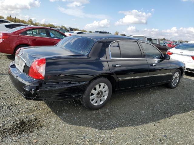 Photo 3 from auction – 2003 LINCOLN TOWN CAR E with VIN 1LNHM84WX3Y704163