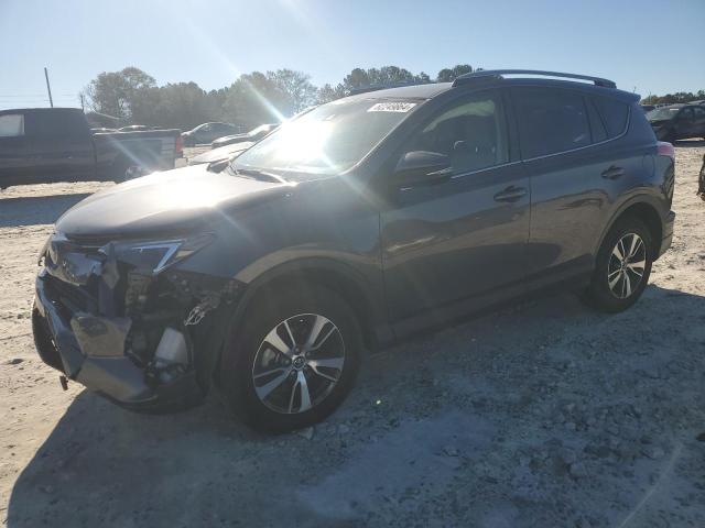 TOYOTA RAV4 XLE 2017 with VIN JTMWFREV0HJ712936 - Photo from auction