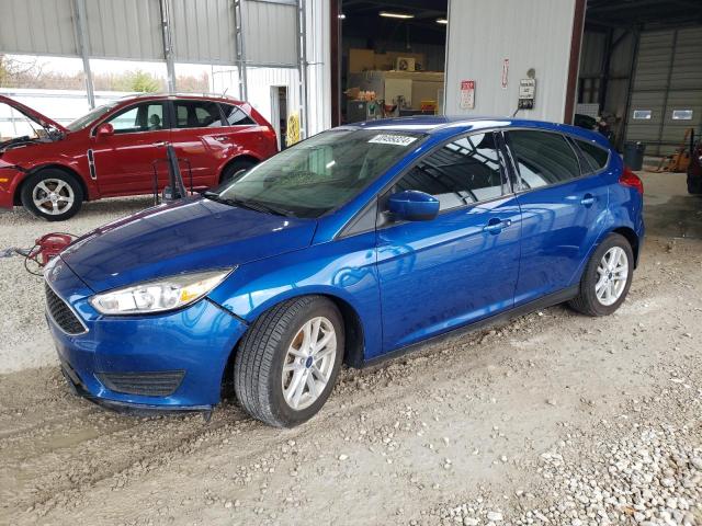 FORD FOCUS SE 2018 with VIN 1FADP3K20JL259087 - Photo from auction