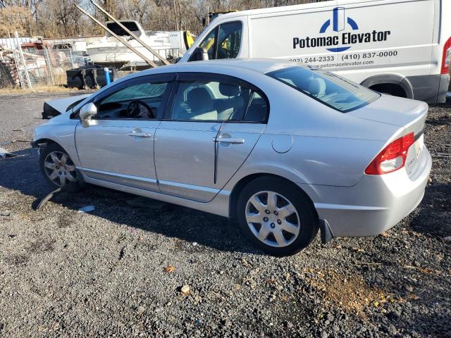 Photo 2 from auction – 2011 HONDA CIVIC LX with VIN 2HGFA1F52BH304222