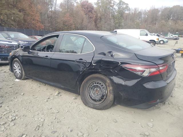 Photo 2 from auction – 2021 TOYOTA CAMRY LE with VIN 4T1C31AK2MU551308