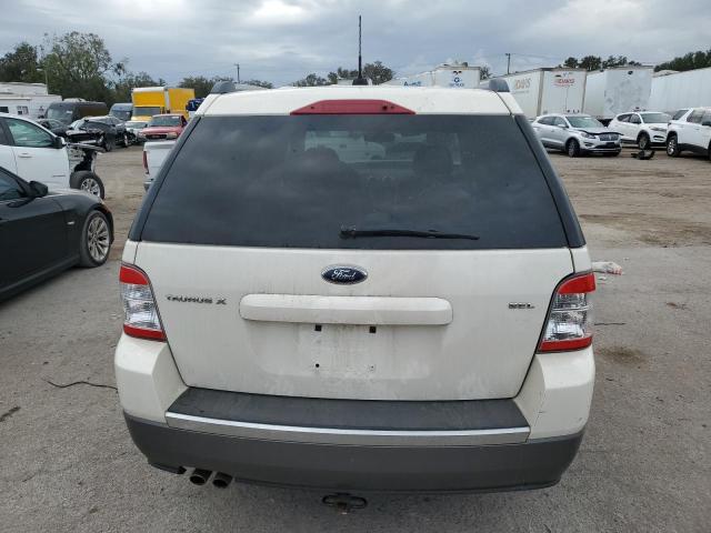 Photo 6 from auction – 2009 FORD TAURUS X S with VIN 1FMDK02WX9GA00925