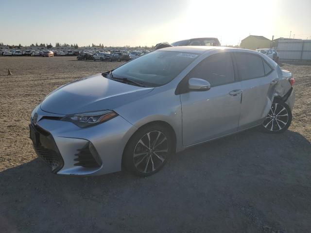 TOYOTA COROLLA L 2018 with VIN 2T1BURHE1JC059910 - Photo from auction