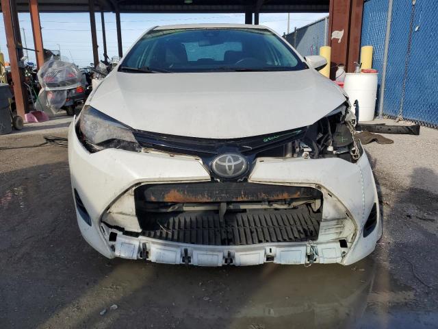 Photo 5 from auction – 2017 TOYOTA COROLLA LE with VIN 5YFBPRHEXHP703583