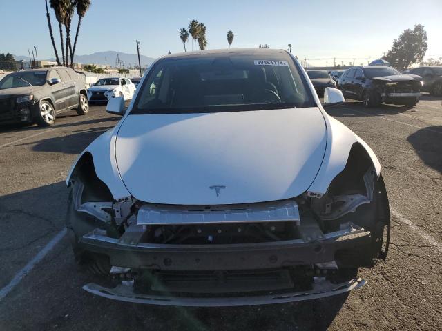 Photo 5 from auction – 2022 TESLA MODEL Y with VIN 7SAYGDEF6NF560975