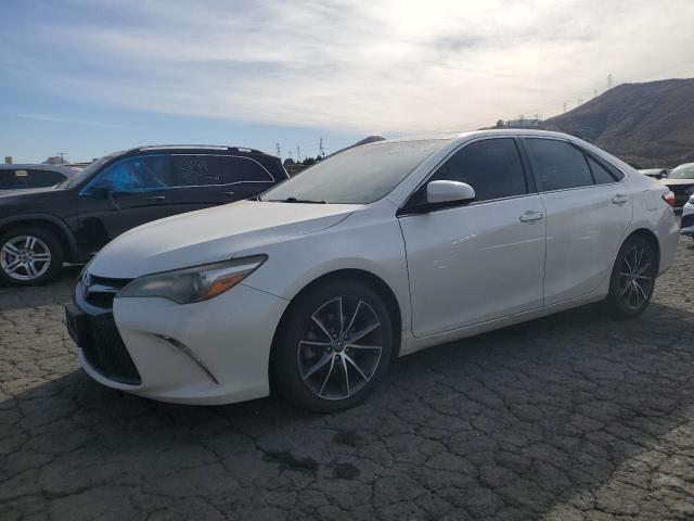 TOYOTA CAMRY LE 2016 with VIN 4T1BF1FK2GU242387 - Photo from auction