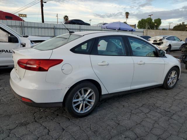 Photo 3 from auction – 2018 FORD FOCUS SE with VIN 1FADP3FE7JL270611