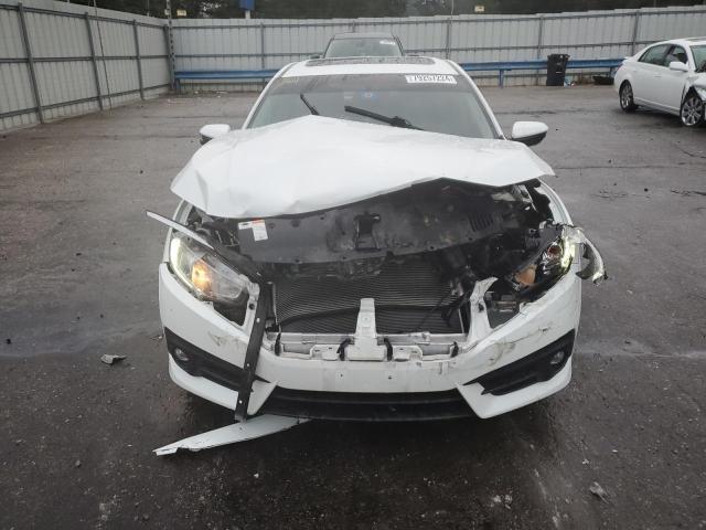 Photo 5 from auction – 2018 HONDA CIVIC EX with VIN JHMFC1F39JX039623