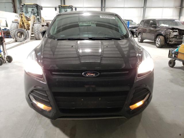 Photo 5 from auction – 2016 FORD ESCAPE SE with VIN 1FMCU9GX5GUC26395