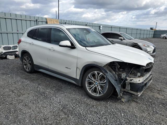 Photo 4 from auction – 2016 BMW X1 XDRIVE2 with VIN WBXHT3C3XG5E56883