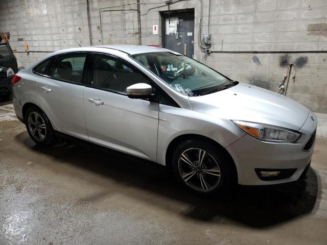 Photo 4 from auction – 2017 FORD FOCUS SE with VIN 1FADP3FE8HL299691
