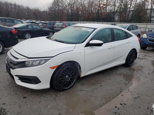 Photo 1 from auction – 2017 HONDA CIVIC LX with VIN 19XFC2F55HE031277