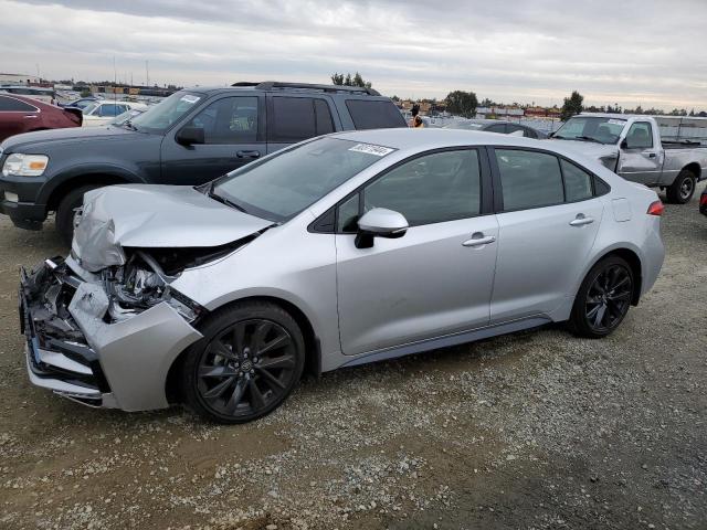 TOYOTA COROLLA LE 2024 with VIN JTDBCMFE1R3065753 - Photo from auction
