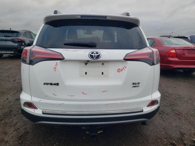 Photo 6 from auction – 2017 TOYOTA RAV4 XLE with VIN JTMRFREV0HJ703800