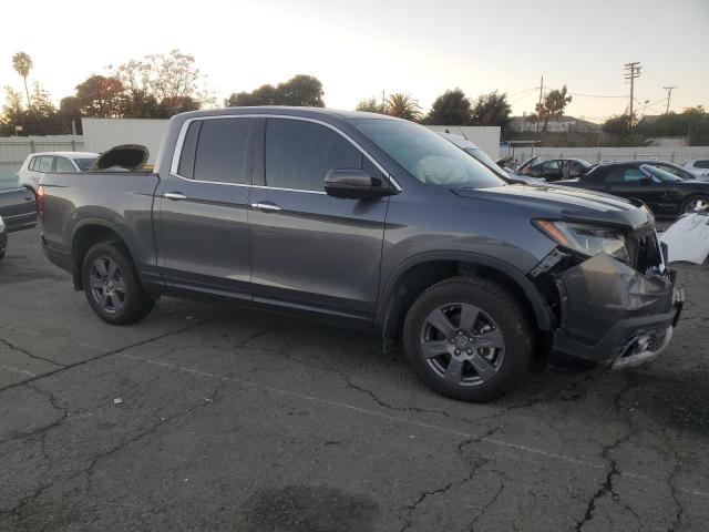 Photo 4 from auction – 2020 HONDA RIDGELINE with VIN 5FPYK3F73LB010893