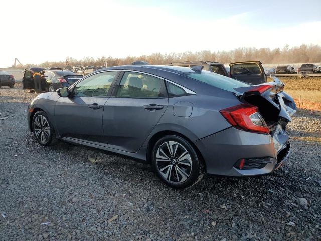 Photo 2 from auction – 2018 HONDA CIVIC EX with VIN JHMFC1F42JX030951