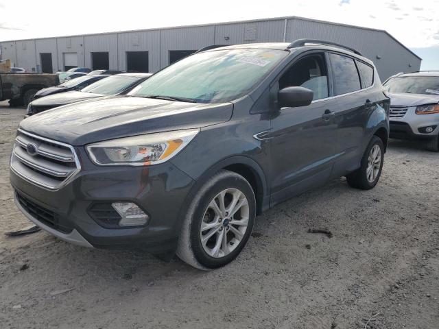 FORD ESCAPE SE 2018 with VIN 1FMCU0GD7JUB00841 - Photo from auction