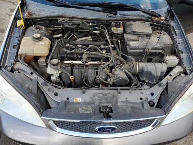 Photo 11 from auction – 2007 FORD FOCUS ZX4 with VIN 1FAFP34N27W284290