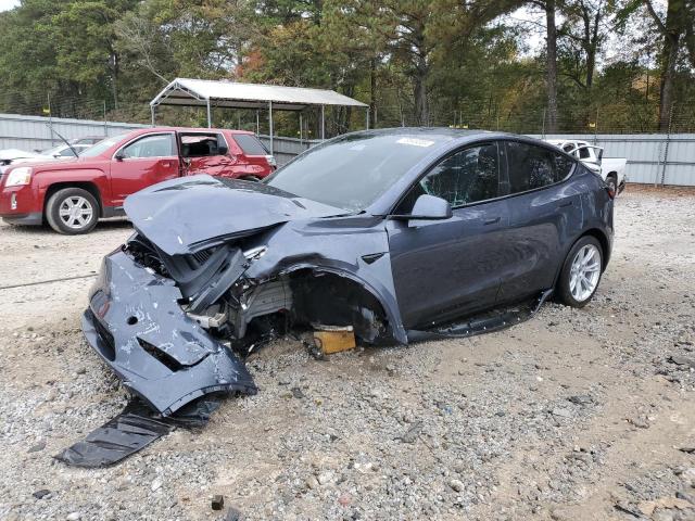 TESLA MODEL Y 2023 with VIN 7SAYGDEE3PF617109 - Photo from auction