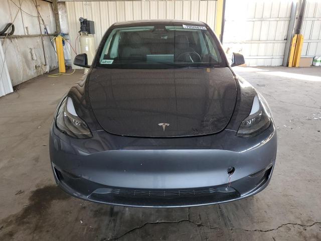 Photo 5 from auction – 2023 TESLA MODEL Y with VIN 7SAYGDEE6PF882588