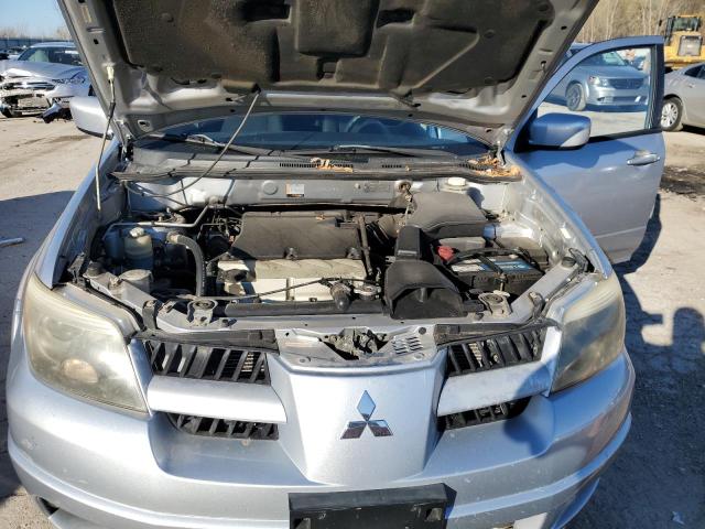 Photo 11 from auction – 2006 MITSUBISHI OUTLANDER with VIN JA4LX41F26U014917