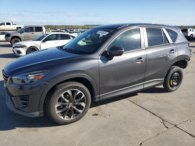 MAZDA CX-5 GT 2016 with VIN JM3KE2DY9G0861197 - Photo from auction