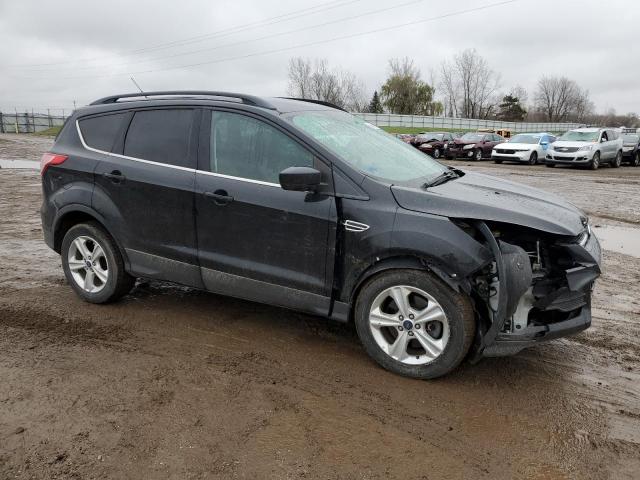 Photo 4 from auction – 2016 FORD ESCAPE SE with VIN 1FMCU9GX7GUB40697