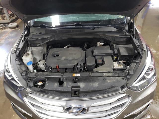 Photo 11 from auction – 2018 HYUNDAI SANTA FE S with VIN 5NMZU3LB6JH056875