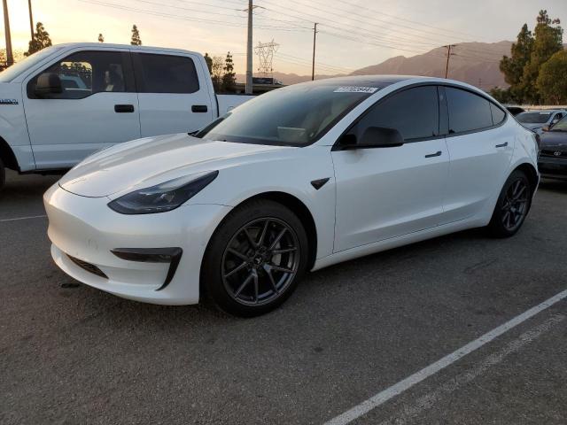 TESLA MODEL 3 2021 with VIN 5YJ3E1EB8MF999487 - Photo from auction