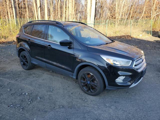 Photo 4 from auction – 2018 FORD ESCAPE SE with VIN 1FMCU9GD6JUD06317
