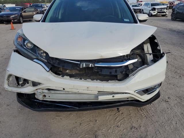 Photo 5 from auction – 2015 HONDA CR-V TOURI with VIN 5J6RM3H90FL007516