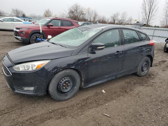 FORD FOCUS SE 2017 with VIN 1FADP3K27HL330165 - Photo from auction