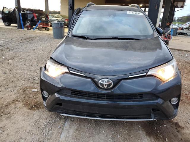 Photo 5 from auction – 2017 TOYOTA RAV4 XLE with VIN JTMWFREV7HD104992