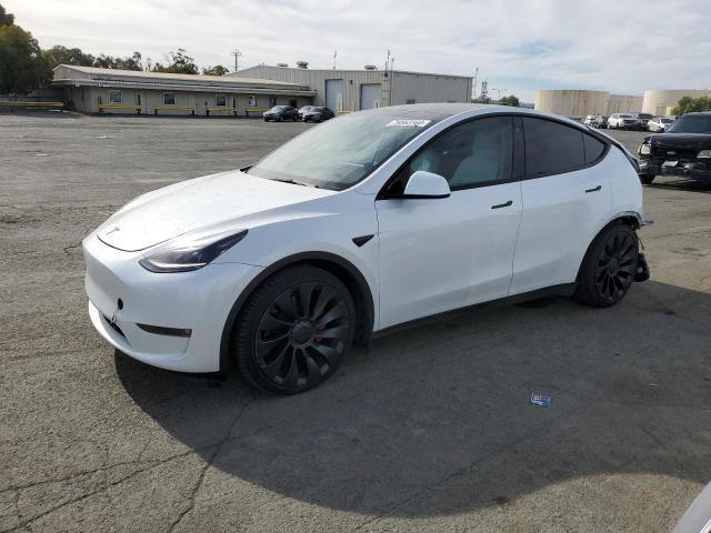 TESLA MODEL Y 2022 with VIN 7SAYGDEF4NF561378 - Photo from auction