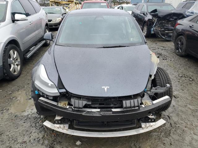 Photo 5 from auction – 2022 TESLA MODEL 3 with VIN 5YJ3E1EB9NF166797