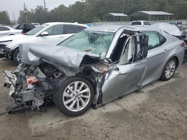 TOYOTA CAMRY LE 2023 with VIN 4T1C11AK2PU078567 - Photo from auction
