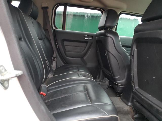Photo 11 from auction – 2009 HUMMER H3 with VIN 5GTEN13E998152256
