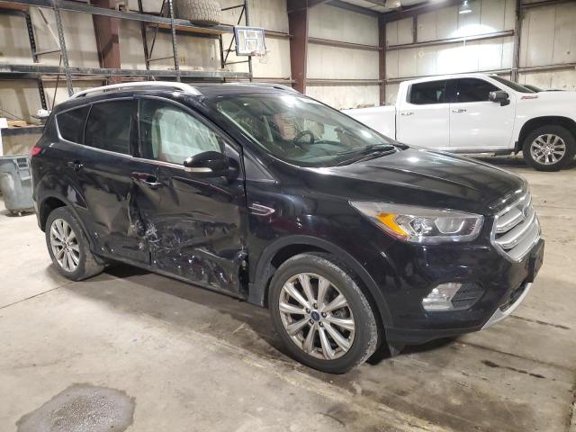 Photo 4 from auction – 2017 FORD ESCAPE TIT with VIN 1FMCU9J99HUD06097