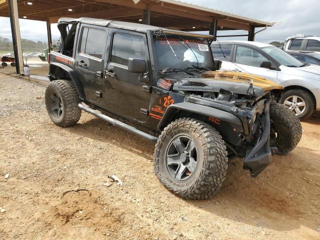 Photo 4 from auction – 2011 JEEP WRANGLER U with VIN 1J4BA3H11BL575191