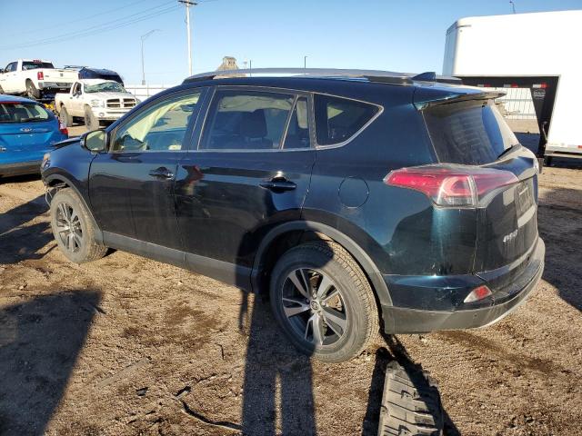 Photo 2 from auction – 2017 TOYOTA RAV4 XLE with VIN JTMRFREV1HD203157