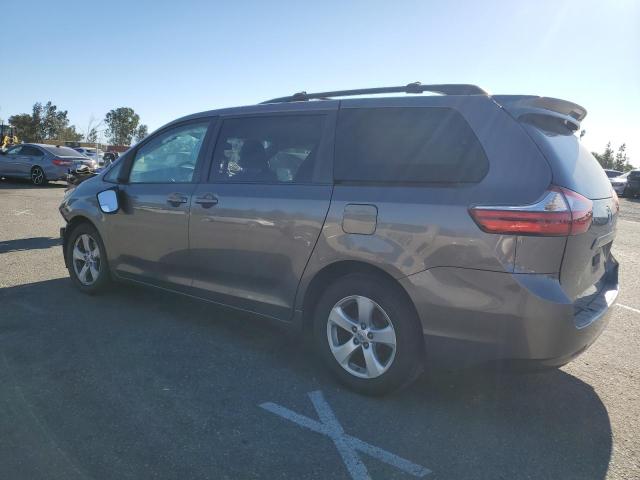Photo 2 from auction – 2015 TOYOTA SIENNA LE with VIN 5TDKK3DC5FS579808