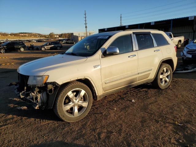 JEEP GRAND CHER 2011 with VIN 1J4RR6GT8BC517526 - Photo from auction